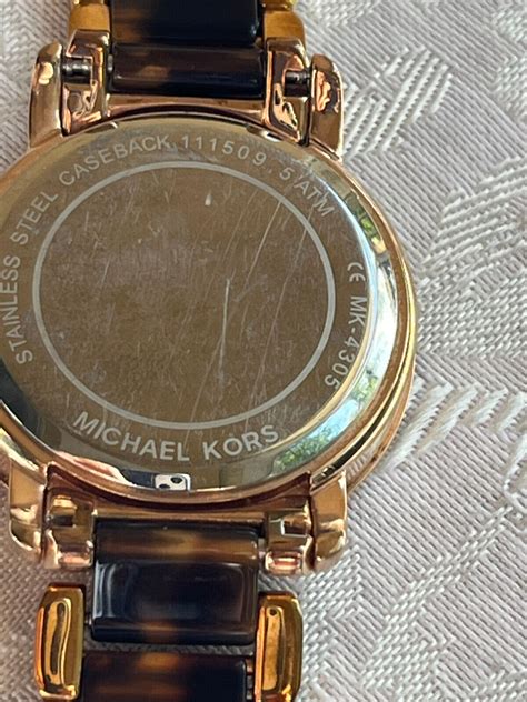 Welche Batterie Kommt in Michael Kors 